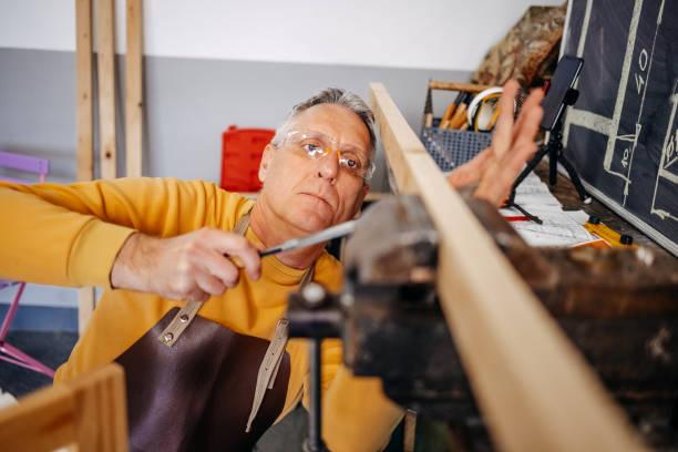 A Man Building Garage Shelves